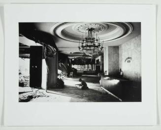 Christian Phalange gunmen crawling through the reception lobby of the Holiday Inn during the civil war, Beirut