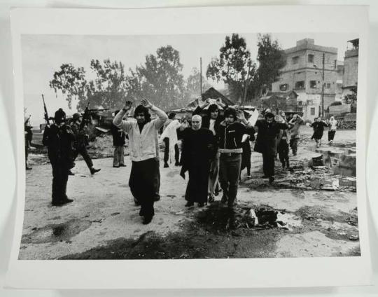 Palestinian civilians surrendering to Christian Phalangist soldiers