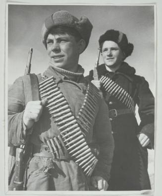 Young Particans from Frunzes detachment (Two young boys with ammunition belts and rifles over their shoulders)