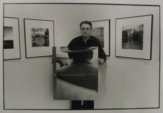 John Cleary with Poster for his Photo League Book