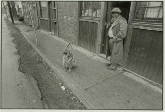 Dog and Man in Coats